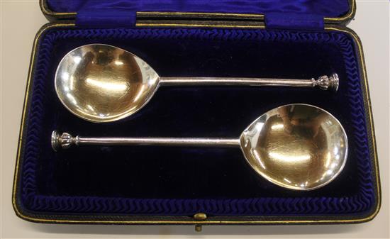 Cased pair of silver seal top spoons(-)